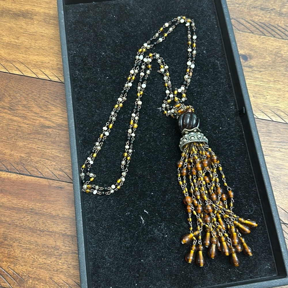 Amber color beads with Tibetan tassel